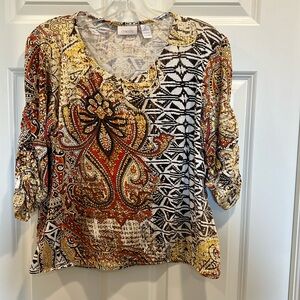 Chicos crop top. Size 2 patterned  3/4 sleeve tee. Elastic banded bottom hem.